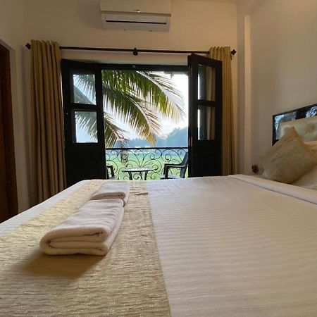 Green Field View Hotel Candolim Bagian luar foto